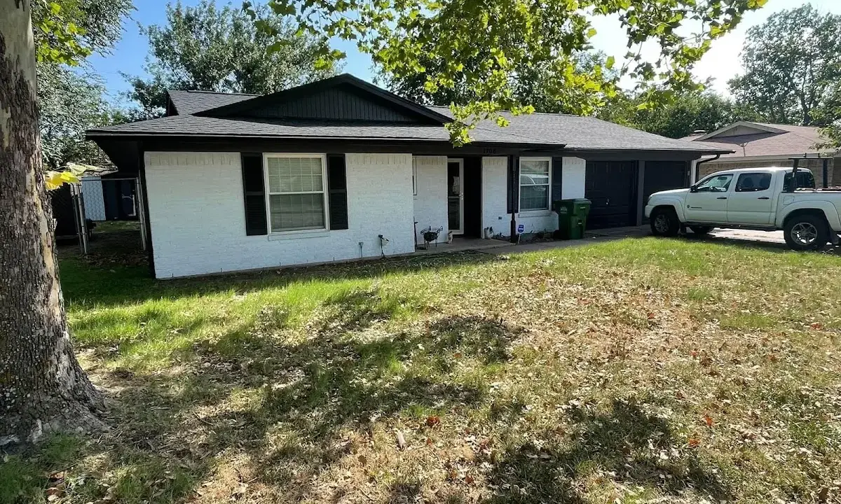 Professional roofing crew working on a residential roof in North Bethesda